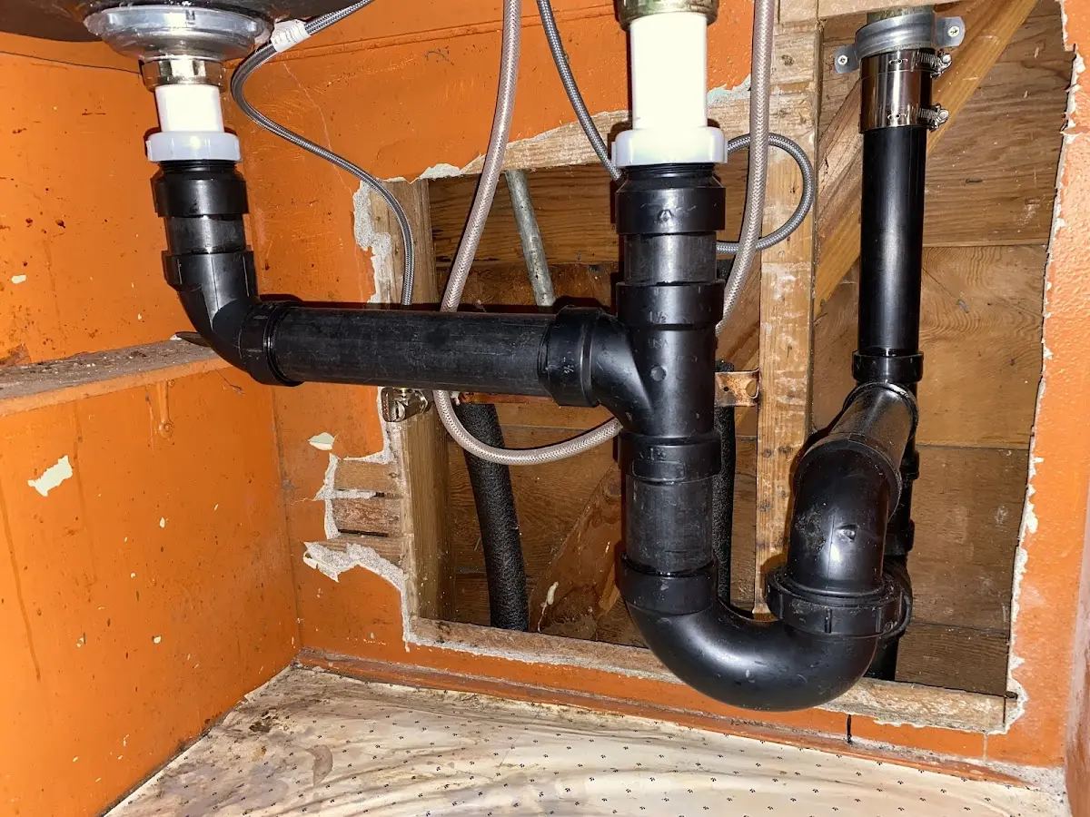 Professional Garbage Disposal Repair equipment and tools on the job in Glendive